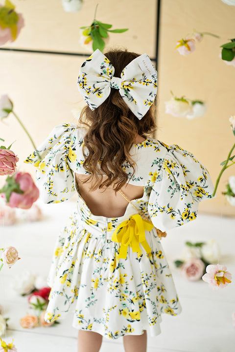 Amarélle Children's cotton dress with floral pattern and yellow ribbon