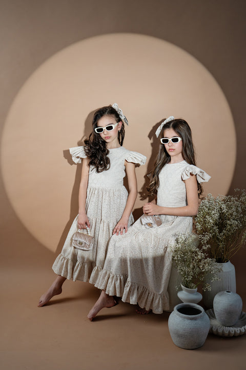 Nude Elegance – Children's cotton dress with ruffles in nude color