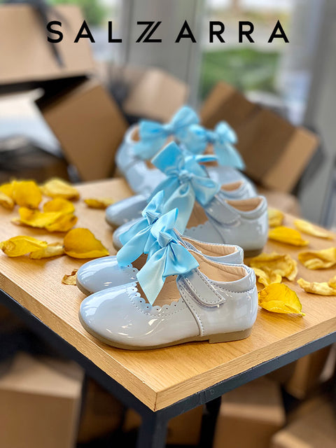 Ballerina Bow Charm Patent leather ballerinas with blue ribbon