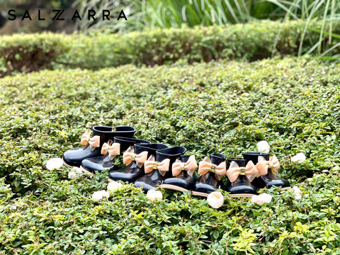 Allaya Rubber boots with beige ribbon