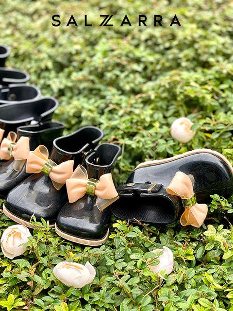 Allaya Rubber boots with beige ribbon