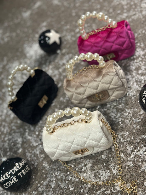 Mini Pearl in black bag  